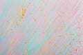 Golden drops and splashes. Hand painted background with wide strokes of blue and pink paint. Place for your design Royalty Free Stock Photo