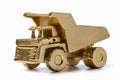 Golden dumper toy made of wood. Royalty Free Stock Photo