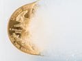 Golden Eagle coin emerging from deep freeze