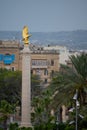 Golden eagle sculpture on a high column in Valetta, Malta. Royalty Free Stock Photo