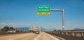 Golden Ears Bridge connecting Maple Ridge to Langley. Traffic on a cable-suspended bridge spanning across Fraser River Royalty Free Stock Photo