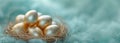 Golden easter colour eggs in nest on pastel blue background in Happy Easter decoration. Spring holiday side view concept Royalty Free Stock Photo