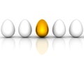 Golden easter egg among similar white eggs Royalty Free Stock Photo