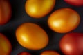 Golden Easter eggs close-up on a black background. Luxurious festive decor. Royalty Free Stock Photo