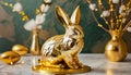 Golden Easter rabbit with golden Easter eggs on a light brown background.