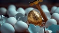 The golden egg contains the hammer among the broken white eggs. The concept represents reliability and resistance in Royalty Free Stock Photo