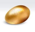 Golden egg with floral pattern