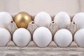 Golden egg and jast eggs Royalty Free Stock Photo