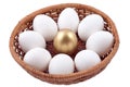 Golden egg and jast eggs in wicker bowl on a white Royalty Free Stock Photo