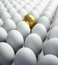 Single golden Egg in a  large Group of white Eggs Royalty Free Stock Photo