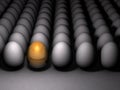 A golden egg that stands out. Future possibilities and promising options. Many eggs are lined up side by side. Royalty Free Stock Photo