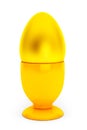 Golden egg in yellow eggcup Royalty Free Stock Photo