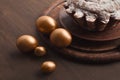Golden eggs and easter cake on table Royalty Free Stock Photo
