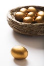 Golden Eggs In Nest Royalty Free Stock Photo