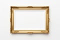 Golden Elegance: Decorative Photo Frame Adorning a Crisp White Wall