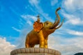 The Golden Elephant under the blue sky