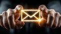 Golden Email Icon Glowing Between Two Hands Royalty Free Stock Photo