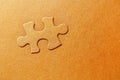 Golden embossed puzzle piece