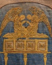 Golden Embroidery depicting the lost ark of the covenant