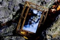 A golden enchanted mirror. A mirror for dreams and desires Royalty Free Stock Photo
