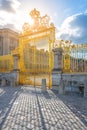 Golden entrance gate to the courtyard of Chateau Versailles Royalty Free Stock Photo