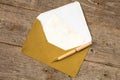 Golden envelope, blank card and pen