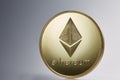 Golden ethereum coin. Crypto currency blockchain coin ethereum symbol on light background.