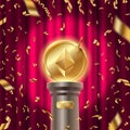 Golden ethereum coin on a pedestal on a stage in spot of light and golden confetti against the red curtain background Royalty Free Stock Photo