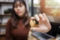 Golden Ethereum cryptocurrency in hand of businesswoman. New Virtual money concept Royalty Free Stock Photo