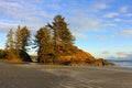 Pacific Rim National Park, Golden Evening Light Shining on Rocks and Trees separating Schooner Cove from Long Beach, BC, Canada Royalty Free Stock Photo