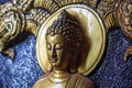 Golden face lord buddha carving Royalty Free Stock Photo