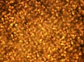 Golden festive background of lots of bright circles