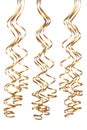 Golden festive serpentine streamers isolated on white ba