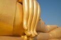 Golden finger of big buddha statue