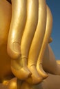 Golden finger of big buddha statue