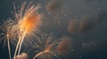 Golden fireworks exploding in the night sky with bright sparks and glowing trails Royalty Free Stock Photo