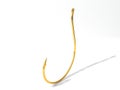 Golden fishing hook. Royalty Free Stock Photo
