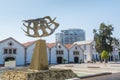 Golden flying seagull bird sculpture of fountain foinikoudes larnaca in front of Larnaca Municipal Art Gallery in Cyprus