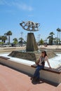 Golden flying seagull bird sculpture on the Larnaca beach