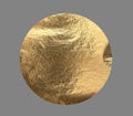 Golden foil texture with a shiny, metallic finish, featuring a round, circular shape. Wrinkled, Royalty Free Stock Photo