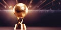 Golden football trophy for champion team in dark studio Royalty Free Stock Photo