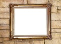 Golden frame on brick stone wall background Royalty Free Stock Photo