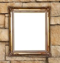 Golden frame on brick stone wall background Royalty Free Stock Photo