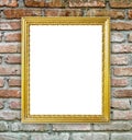 Golden frame on brick stone wall background Royalty Free Stock Photo
