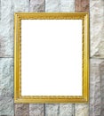 Golden frame on brick stone wall background Royalty Free Stock Photo