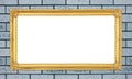 Golden frame on brick stone wall background Royalty Free Stock Photo