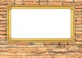 Golden frame on brick stone wall background Royalty Free Stock Photo