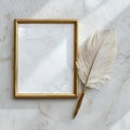A golden frame with a marble texture background next to a large elegant feather pen with a golden handle isolated Royalty Free Stock Photo