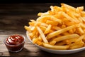 Golden French fries accompanied by tangy ketchup and rich sour cream