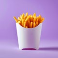Golden fries in a white container against a light purple background in a studio setting with shadows Royalty Free Stock Photo